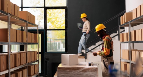 Warehouse workers managing bulk orders for B2B fulfillment